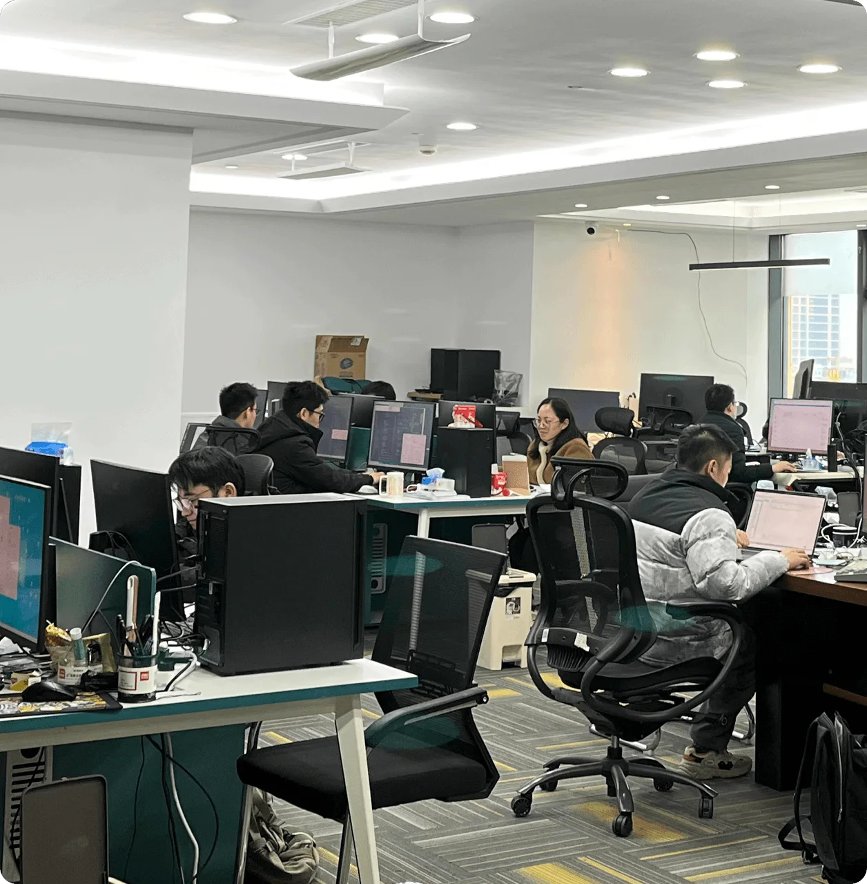 Weyland research and development team working in the company office
